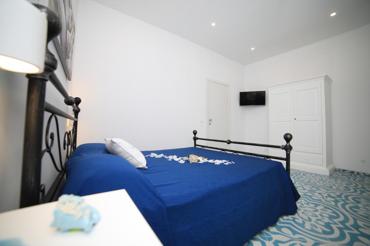 White Aurora Rooms Porto Cesareo Buitenkant foto