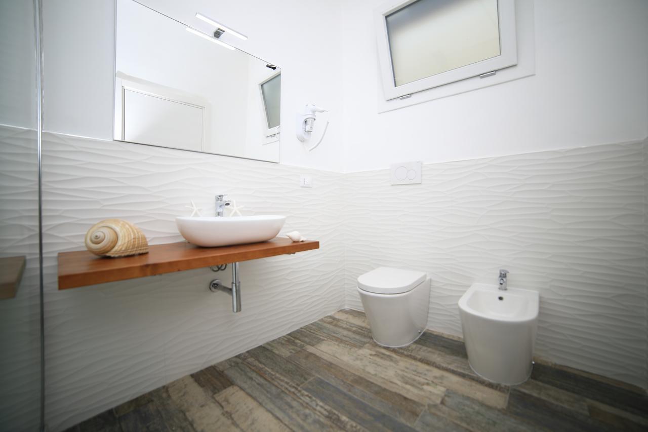 White Aurora Rooms Porto Cesareo Buitenkant foto